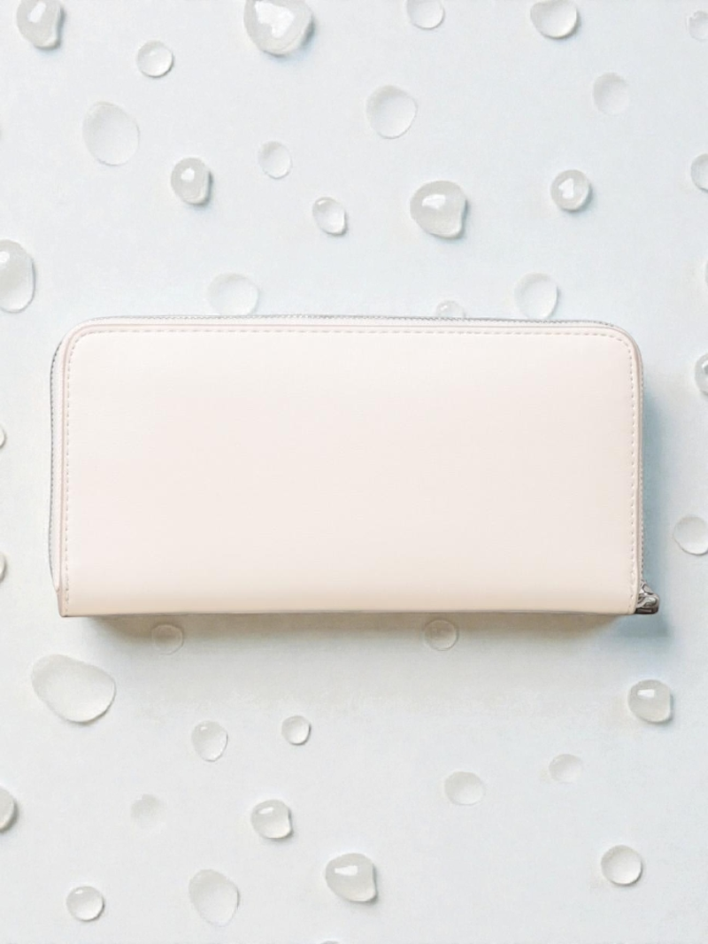 Immediate C.K Sculpted Impression Zip Wallet