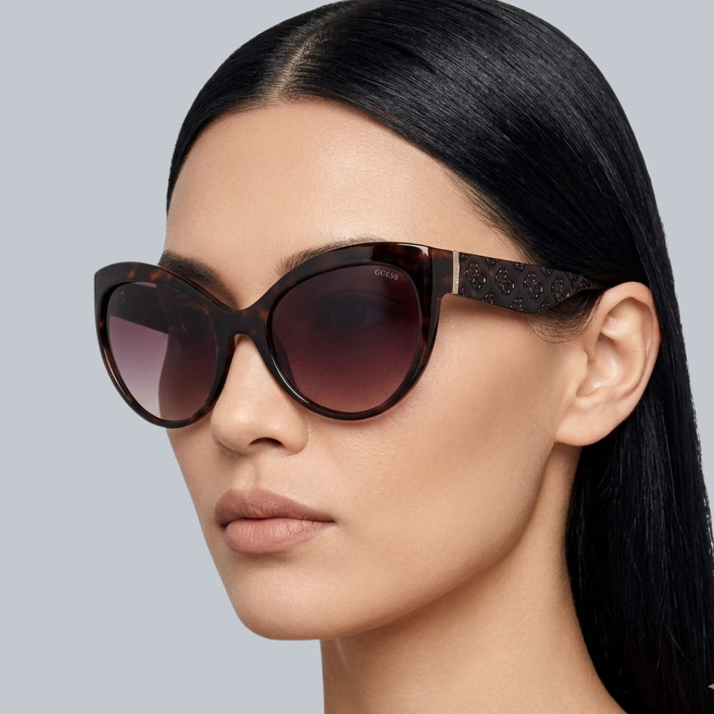 Guess 
Gradient Brown Butterfly Ladies Sunglasses
Item No. GU00130 52F 61