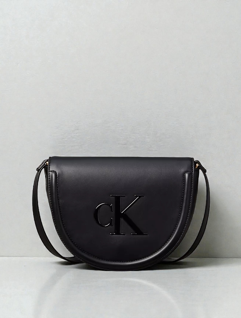 Embossed Monogram Saddle Bag