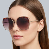 Guess 
Brown Gradient Butterfly Ladies Sunglasses
Item No. GF0410 32F 59