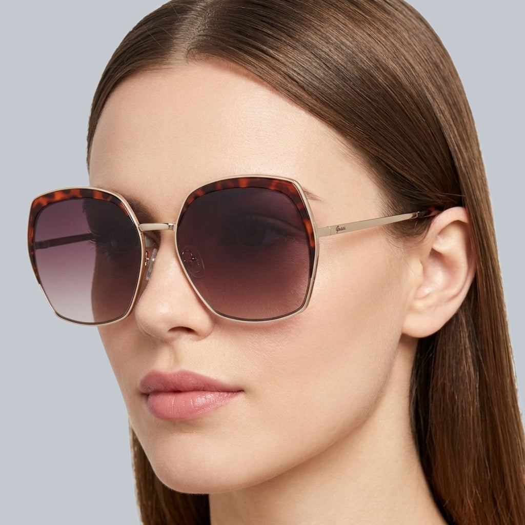Guess 
Brown Gradient Butterfly Ladies Sunglasses
Item No. GF0410 32F 59